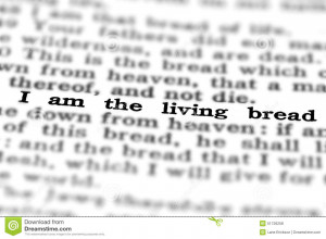 Detail closeup of New Testament Scripture quote I am the living breach ...
