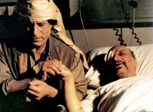 Colonel Gaddafi visiting Yasser Arafat in hospital after his air crash ...
