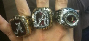 ... ring from school is on the left national championship ring