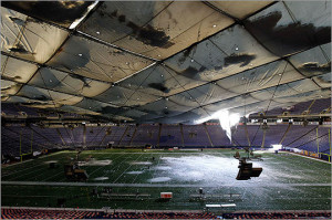 Snow fell onto the field from a hole in the collapsed roof of the ...