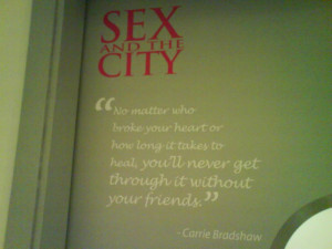 quote from Carrie Bradshaw on the door of a ladies restroom in ...