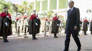 Italian PM Enrico Letta arrives at the presidential palace to hand in ...