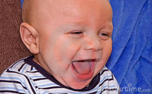 This darling happy bi-racial baby boy in 4 months old and is laughing.
