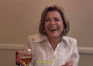 Lucille Bluth Via A cocktail in her hand and confetti in her hair.