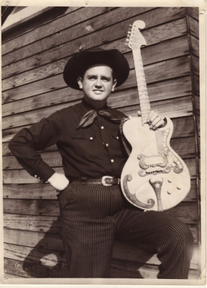 Merle Travis beat them both by four years.