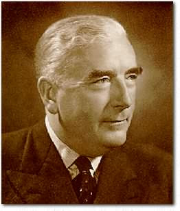 Australian Prime Minister Sir Robert Menzies (1894 - 1978), to a woman ...