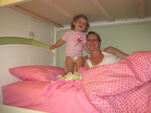 Harper in her big girl bed (a bunk bed). She has been in it a week and ...