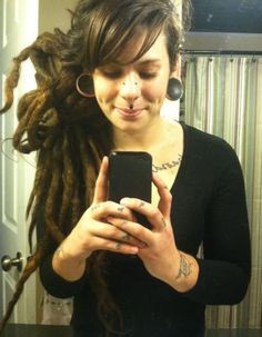 Beautiful locks with cute bangs. Stretched ears, philtrum, and bridge ...