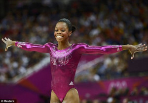 Whiz Kid: Gabrielle Douglas of the U.S. smiles after competing in the ...