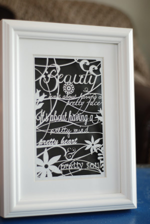 Inspirational beauty quote laser cut into high quality exotic paper