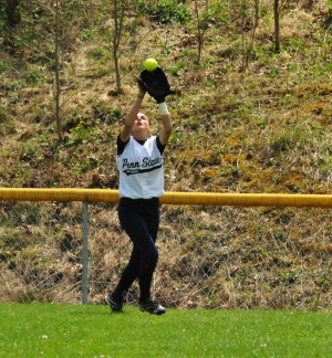 Softball outfielder catch