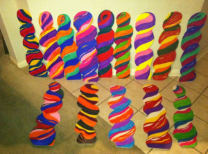 Cardboard lollipops cutouts, colored with markers on foam board then ...