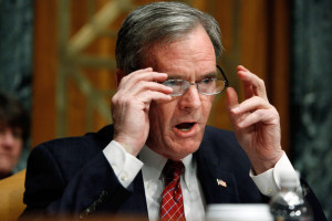 Senate Budget Committee ranking member Sen Judd Gregg R HN raises