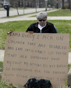 Racist man, 62, ordered to hold 'I'm a bully!' sign for tormenting ...