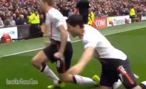 Watch Luis Suarez Trying to Bite Steven Gerrard -GIF-