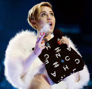 Miley Cyrus smokes a joint onstage during the MTV EMA's on November 10 ...