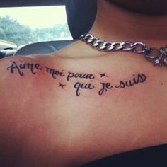 Collarbone quote tattoo in French. It means 
