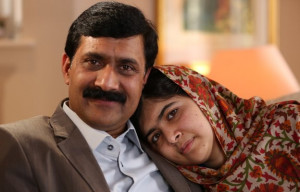 Malala with her father Ziauddin Yousafzai in Birmingham
