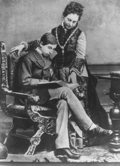 young Kaiser Wilhelm II posed with a book and his mother, 1876 More