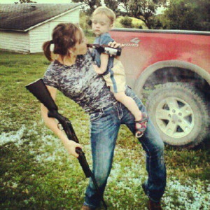 REAL Mom's can drink, shoot, and hold their kids