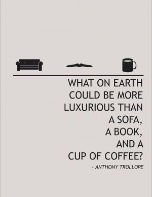 sofa, a book, and a cup of coffee