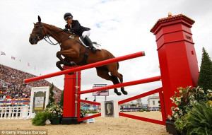... : Royal's horror as her horse clips fence during show-jumping final