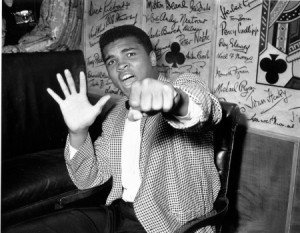 1963: A supremely confident Cassius Clay holds up five fingers (above ...