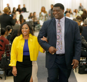 Ray Brown Ashley Brown and former NFL player Ray Brown walk the runway