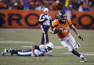 Broncos tight end Jacob Tamme (84) runs with the ball after catching a ...