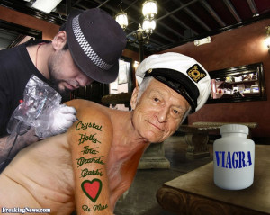 Hugh Hefner Getting a Tattoo