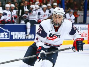 Hilary Knight #21 of Team USA skates up the ice against Team Canada ...