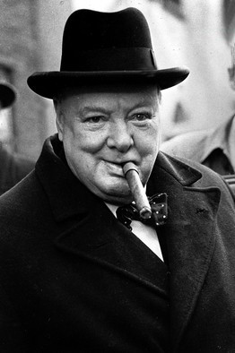 Churchill liked to use cigars as a prop. Popperfoto/Getty Images