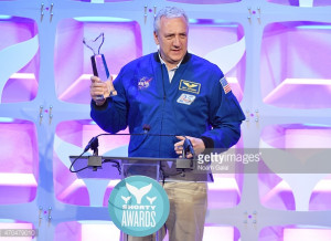 News Photo Astronaut Michael J Massimino accepts a Shorty