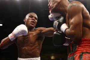 Floyd Mayweather Hits Zab Judah With A Left To The Face During