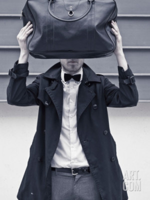 india-hobson-a-man-wearing-a-bow-tie-hiding-behind-a-bag_i-G-67-6702 ...
