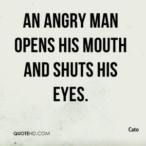 An angry man opens his mouth and shuts his eyes.