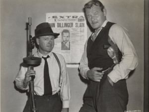 Partnering Mickey Rooney in Baby Face Nelson (1957).