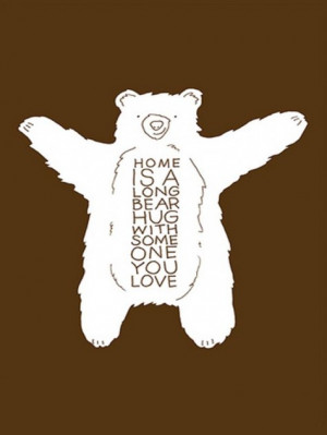 Home is a long bear hug with someone you love.