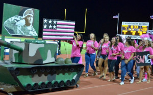 The juniors proudly display their float, modeled after a tank and ...