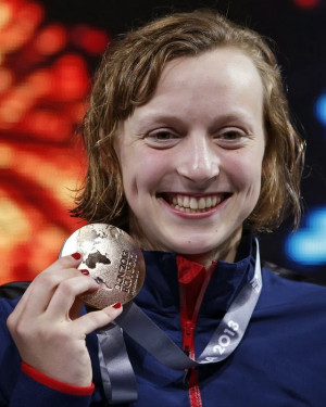 Katie Ledecky , ST'15 of the United States smiles as she holds her ...