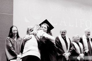 Loretta Sanchez embracing a graduate student