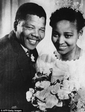 ... member Nelson Mandela posing with his wife Winnie during their wedding