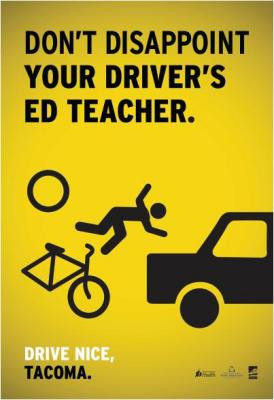 series of signs warning motorists to be more aware while driving is ...