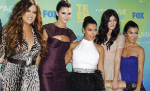 IN PHOTO: Kendall (2nd L) and Kylie Jenner (2nd R) pose with their ...