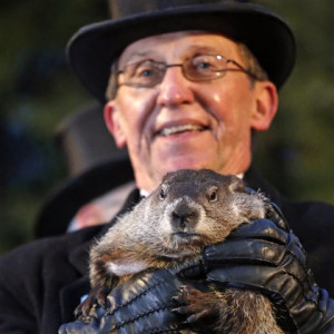 ... Day Groundhog Club handler Ron Ploucha holds Punxsutawney