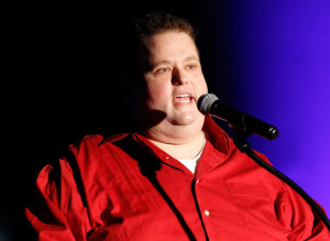 Ralphie May Comedian Ralphie May speaks onstage during the T J