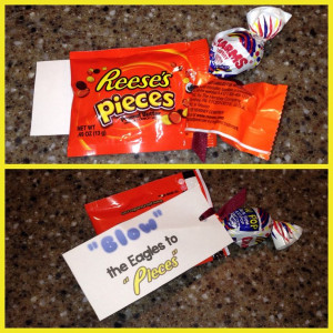 ... .com. Reese's Pieces and a Charms Blow Pop tied together with ribbon