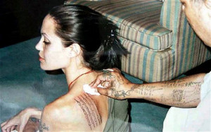 Make like Angelina and tattoo some important words on your hide. Why ...