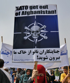Afghan people take part in an anti U.S. rally organized by