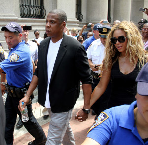 Love is beautiful, Jay-Z and Beyoncé holding hands during the Trayvon ...